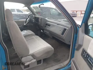 1993 GMC Sierra 1500 with VIN 1GTGC29N2PE564309, listed as a IAAI auction lot 40854317 with 112,341 mi miles and . Bid and sale history available at DreamBid. Image 5.