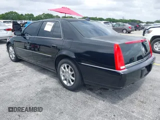 2010 Cadillac DTS w/1SC with VIN 1G6KD5EY8AU106072, listed as a IAAI auction lot 41999952 with 165,866 mi miles. Bid and sale history available at carsss.com. Image 3.