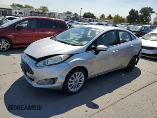 2017 Ford Fiesta Titanium with VIN 3FADP4CJ6HM139301, listed as a Copart auction lot 70086444 with 126,213 mi miles and Salvage Title. Bid and sale history available at carsss.com. Image 1.