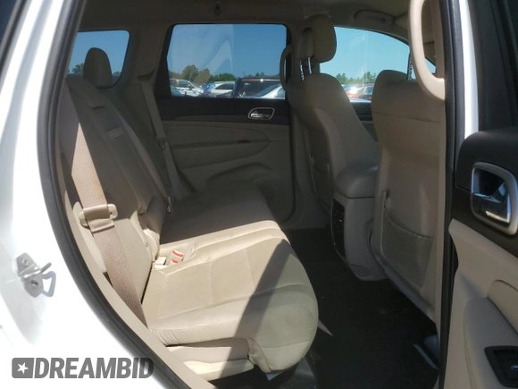 2016 Jeep Grand Cherokee Laredo with VIN 1C4RJEAG4GC500524, listed as a Copart auction lot 61613725 with 122,467 mi miles and Salvage title. Bid and sale history available at DreamBid. Image 11.