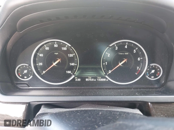 2015 BMW 7 Series 750Li xDrive with VIN WBAYF8C56FD654765, listed as a IAAI auction lot 40734550 with 133,848 mi miles and . Bid and sale history available at carsss.com. Image 7.