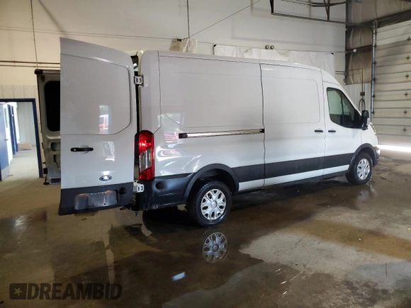 2022 Ford E-Transit Cargo z VIN 1FTBW9CK2NKA33103, wystawiony jako Copart lot #62696104 z przebiegiem 27 706 mil mil oraz Szkoda całkowita • Salvage title. Historia ofert i sprzedaży dostępna na DreamBid. Obrazek 3.