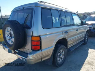 1997 Mitsubishi Montero z VIN JA4MR41R3VJ006477, wystawiony jako IAAI lot #41326277 z przebiegiem 239 378 mil mil oraz . Historia ofert i sprzedaży dostępna na DreamBid. Obrazek 4.