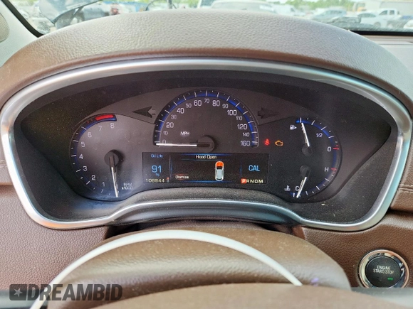 2015 Cadillac SRX Performance Collection with VIN 3GYFNCE34FS574161, listed as a Copart auction lot 60151945 with 108,844 mi miles and Salvage title. Bid and sale history available at DreamBid. Image 9.