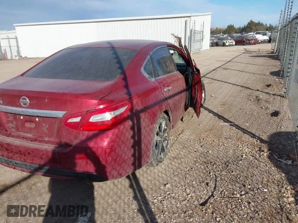 2016 Nissan Altima S with VIN 1N4AL3AP9GN379818, listed as a IAAI auction lot 41685681 with 185,637 mi miles and . Bid and sale history available at carsss.com. Image 4.