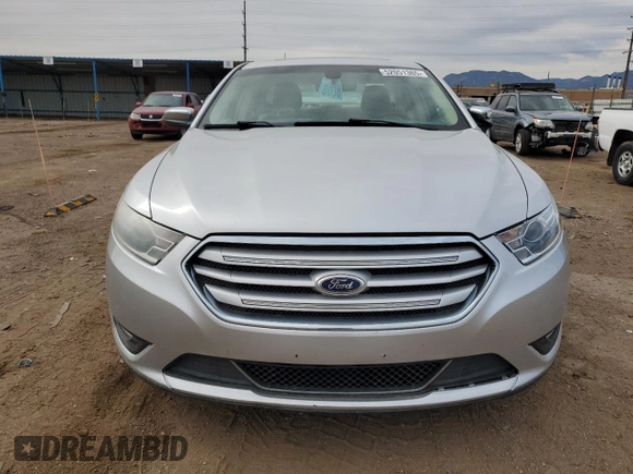 2013 Ford Taurus Limited with VIN 1FAHP2F82DG235526, listed as a Copart auction lot 52051365 with 106,459 mi miles and Salvage Title. Bid and sale history available at DreamBid. Image 5.