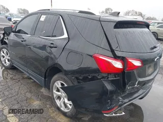 2019 Chevrolet Equinox LT with VIN 2GNAXLEX3K6186898, listed as a IAAI auction lot 41525229 with 77,673 mi miles and . Bid and sale history available at DreamBid. Image 3.