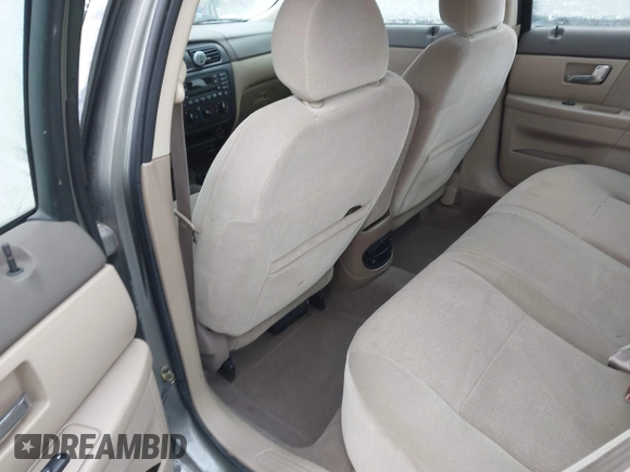2002 Ford Taurus SE Standard with VIN 1FAFP53U92G153588, listed as a IAAI auction lot 41589338 with 57,856 mi miles and . Bid and sale history available at DreamBid. Image 7.