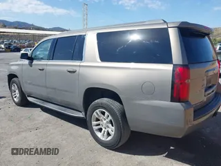 2017 Chevrolet Suburban LS with VIN 1GNSCGEC9HR355405, listed as a IAAI auction lot 41674594 with 170,312 mi miles and . Bid and sale history available at DreamBid. Image 3.