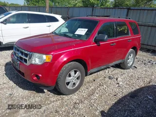 2009 Ford Escape XLS with VIN 1FMCU02759KC80412, listed as a IAAI auction lot 42228138 with 181,786 mi miles and . Bid and sale history available at DreamBid. Image 2.