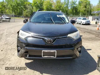 2018 Toyota RAV4 XLE with VIN 2T3WFREVXJW471443, listed as a Copart auction lot 54890655 with 131,677 mi miles and Salvage title. Bid and sale history available at DreamBid. Image 5.