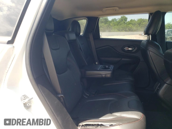 2016 Jeep Cherokee Trailhawk with VIN 1C4PJMBS3GW102000, listed as a Copart auction lot 60866505 with 120,985 mi miles and Salvage title. Bid and sale history available at DreamBid. Image 11.
