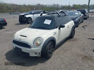2007 MINI Hardtop S with VIN WMWMF73547TV31403, listed as a IAAI auction lot 42066433 with 156,730 mi miles and . Bid and sale history available at DreamBid. Image 18.