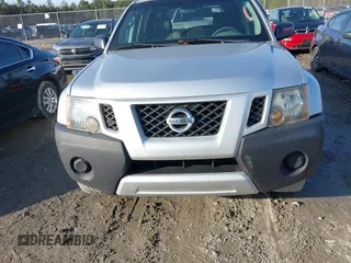2012 Nissan Xterra X with VIN 5N1AN0NU1CC517484, listed as a IAAI auction lot 41569404 with 225,591 mi miles and . Bid and sale history available at DreamBid. Image 11.