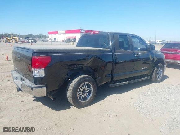 2010 Toyota Tundra 2WD Truck with VIN 5TFRM5F10AX010142, listed as a IAAI auction lot 40586543 with 280,387 mi miles. Bid and sale history available at carsss.com. Image 4.
