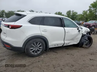 2021 Mazda CX-9 Touring with VIN JM3TCBCY1M0517709, listed as a Copart auction lot 57624945 with 64,081 mi miles and Salvage title. Bid and sale history available at DreamBid. Image 3.