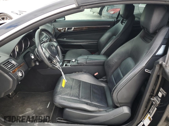 2015 Mercedes-Benz E 400 with VIN WDDKK6FF4FF304607, listed as a Copart auction lot 80517184 with 111,537 mi miles and Salvage title. Bid and sale history available at DreamBid. Image 7.