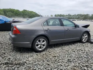 2012 Ford Fusion SE with VIN 3FAHP0HA0CR355529, listed as a Copart auction lot 62585515 with 113,094 mi miles and Salvage title. Bid and sale history available at DreamBid. Image 3.