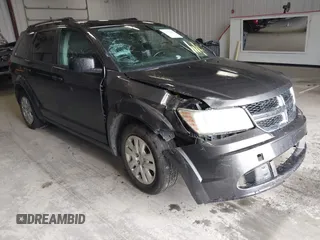 2017 Dodge Journey SE z VIN 3C4PDCAB3HT560856, wystawiony jako IAAI lot #42184482 z przebiegiem 180 379 mil mil oraz . Historia ofert i sprzedaży dostępna na DreamBid. Obrazek 1.
