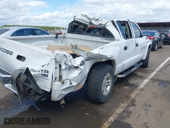 2004 Dodge Dakota SLT with VIN 1D7HG48N14S758614, listed as a IAAI auction lot 41907403 with 242,343 mi miles. Bid and sale history available at carsss.com. Image 4.