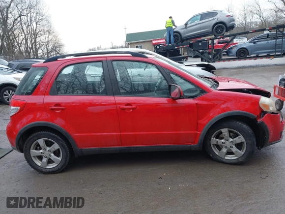 2011 Suzuki SX4 Crossover with VIN JS2YB5A39B6301570, listed as a IAAI auction lot 41666875 with 103,724 mi miles. Bid and sale history available at carsss.com. Image 13.