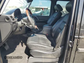 2003 Mercedes-Benz G-Class with VIN WDCYR49E43X135065, listed as a Copart auction lot 71833684 with 171,089 mi miles and Salvage Title. Bid and sale history available at carsss.com. Image 7.
