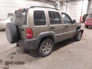 2003 Jeep Liberty Sport with VIN 1J4GL48K83W652993, listed as a IAAI auction lot 41086140 with 115,177 mi miles and . Bid and sale history available at DreamBid. Image 4.