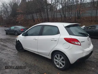 2012 Mazda 2 Touring z VIN JM1DE1LY4C0141202, wystawiony jako IAAI lot #41051663 z przebiegiem 160 364 mil mil oraz . Historia ofert i sprzedaży dostępna na DreamBid. Obrazek 3.