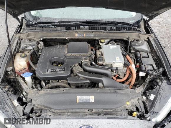 2016 Ford Fusion Titanium Hybrid z VIN 3FA6P0RU5GR356987, wystawiony jako Copart lot #48211775 z przebiegiem 145 192 mil mil oraz Szkoda całkowita • Salvage title. Historia ofert i sprzedaży dostępna na DreamBid. Obrazek 13.