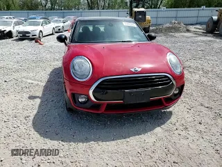2016 MINI Clubman z VIN WMWLN5C53G2B35247, wystawiony jako Copart lot #56463705 z przebiegiem 107 227 mil mil oraz Nie do naprawy. Historia ofert i sprzedaży dostępna na DreamBid. Obrazek 14.