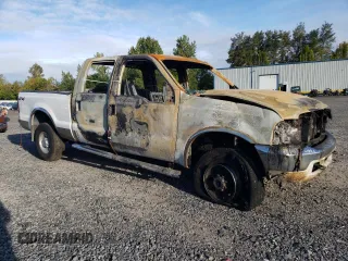 2000 Ford Super Duty F-250 XL with VIN 1FTNW21S9YEC44065, listed as a Copart auction lot 71174294 with 0 mi miles and Salvage Title. Bid and sale history available at carsss.com. Image 4.
