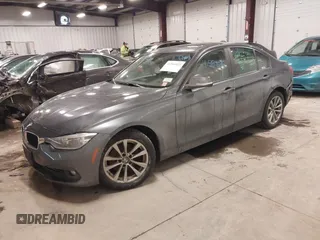 2018 BMW 3 Series 320i xDrive with VIN WBA8E5G50JNU48047, listed as a IAAI auction lot 41564022 with 69,971 mi miles. Bid and sale history available at carsss.com. Image 2.