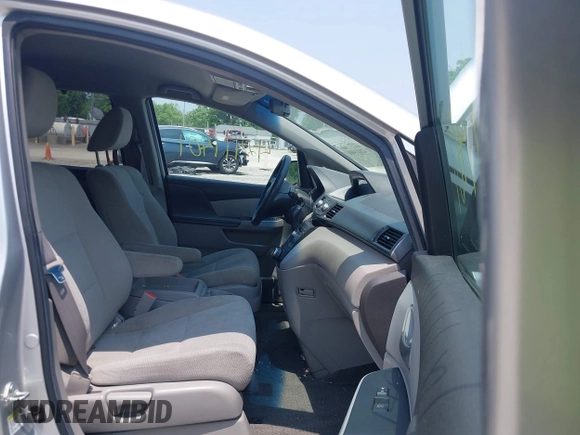 2012 Honda Odyssey EX z VIN 5FNRL5H44CB038825, wystawiony jako IAAI lot #42411401 z przebiegiem 214 164 mil mil oraz . Historia ofert i sprzedaży dostępna na DreamBid. Obrazek 5.
