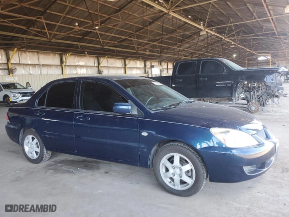 2004 Mitsubishi Lancer LS with VIN JA3AJ36E34U021640, listed as a Copart auction lot 72087834 with 123,951 mi miles and Salvage Title. Bid and sale history available at carsss.com. Image 4.