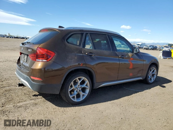 2015 BMW X1 xDrive28i z VIN WBAVL1C5XFVY35610, wystawiony jako Copart lot #54063125 z przebiegiem 115 279 mil mil oraz Szkoda całkowita • Salvage title. Historia ofert i sprzedaży dostępna na DreamBid. Obrazek 3.