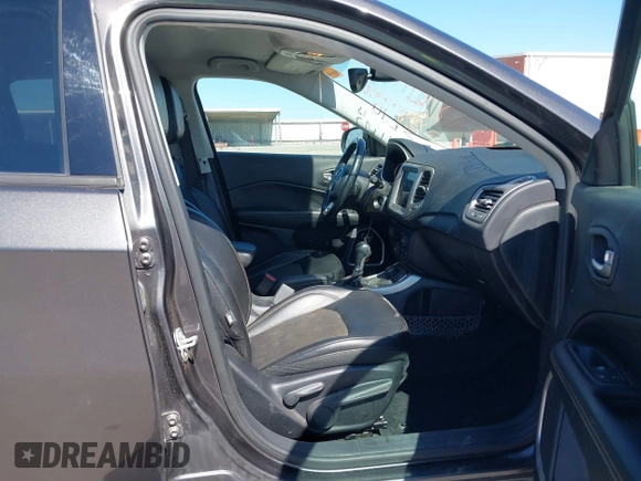 2018 Jeep Compass Altitude with VIN 3C4NJDBBXJT185252, listed as a IAAI auction lot 41847785 with 126,915 mi miles and . Bid and sale history available at carsss.com. Image 5.