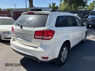 2012 Dodge Journey SXT with VIN 3C4PDDBG6CT249396, listed as a Copart auction lot 74334824 with 158,628 mi miles and Clean title. Bid and sale history available at DreamBid. Image 4.