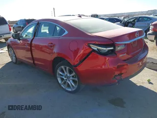 2017 Mazda 6 Touring with VIN JM1GL1V51H1126762, listed as a IAAI auction lot 41394606 with 62,072 mi miles and . Bid and sale history available at DreamBid. Image 3.