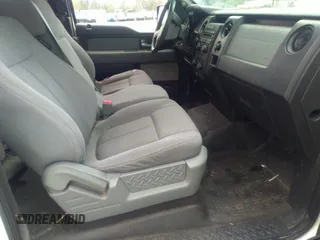 2014 Ford F-150 XL with VIN 1FTFX1EFXEKE16495, listed as a IAAI auction lot 41077199 with 206,212 mi miles. Bid and sale history available at carsss.com. Image 5.