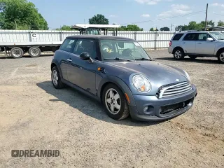 2011 MINI Hardtop with VIN WMWSU3C54BT184251, listed as a Copart auction lot 59298135 with 123,864 mi miles and Salvage title. Bid and sale history available at DreamBid. Image 13.