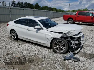 2021 BMW 4 Series 430i with VIN WBA4J1C57KBM15722, listed as a Copart auction lot 52690175 with 55,704 mi miles and Salvage Title. Bid and sale history available at DreamBid. Image 4.