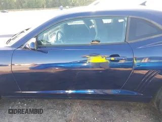 2011 Chevrolet Camaro 1LT z VIN 2G1FB1ED0B9124065, wystawiony jako IAAI lot #42203698 z przebiegiem 190 555 mil mil oraz . Historia ofert i sprzedaży dostępna na DreamBid. Obrazek 14.