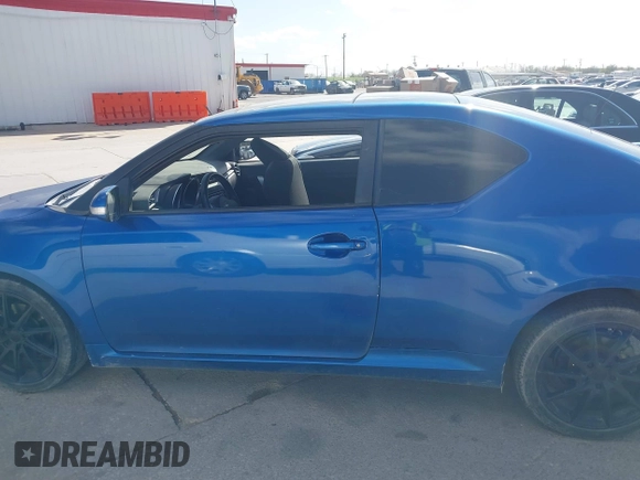 2015 Scion tC with VIN JTKJF5C77F3088828, listed as a IAAI auction lot 41846399 with 203,677 mi miles. Bid and sale history available at carsss.com. Image 14.