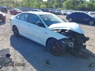 2019 Volkswagen Jetta GLI S z VIN 3VW6T7BU9KM177332, wystawiony jako IAAI lot #42197935 z przebiegiem 93 449 mil mil oraz . Historia ofert i sprzedaży dostępna na DreamBid. Obrazek 1.