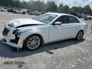 2015 Cadillac CTS Luxury RWD with VIN 1G6AR5S32F0124524, listed as a Copart auction lot 61402765 with 77,377 mi miles and Salvage title. Bid and sale history available at DreamBid. Image 1.