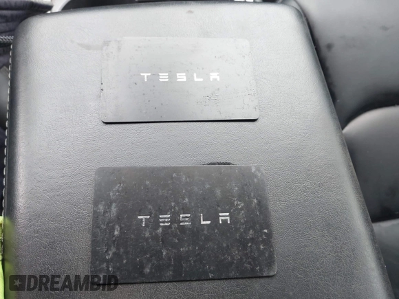 2021 Tesla Model 3 Long Range z VIN 5YJ3E1EB9MF014985, wystawiony jako IAAI lot #41672208 z przebiegiem 52 222 mil mil oraz . Historia ofert i sprzedaży dostępna na DreamBid. Obrazek 11.