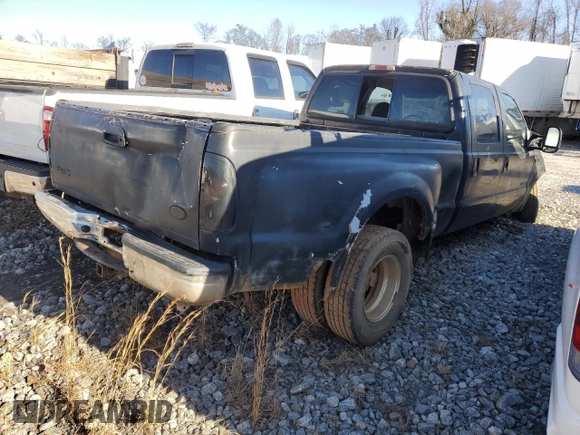 2001 Ford F-350 XL with VIN 1FTWW32F21ED02292, listed as a Copart auction lot 89184265 with 318,261 mi miles and Salvage title. Bid and sale history available at DreamBid. Image 3.