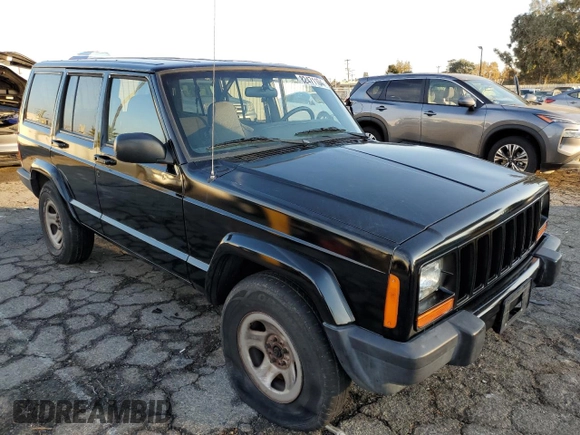2001 Jeep Cherokee Sport with VIN 1J4FT48S51L568981, listed as a Copart auction lot 82471104 with 181,870 mi miles and Salvage Title. Bid and sale history available at carsss.com. Image 4.