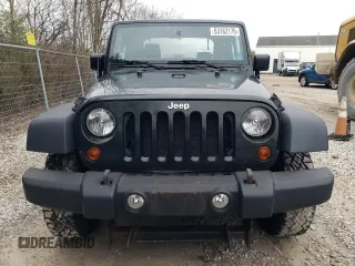 2011 Jeep Wrangler Sport with VIN 1J4AA2D18BL505697, listed as a Copart auction lot 53162175 with 144,024 mi miles and Clean Title. Bid and sale history available at carsss.com. Image 5.