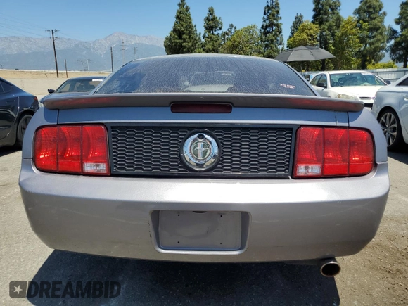 2007 Ford Mustang Deluxe with VIN 1ZVFT80N775319949, listed as a Copart auction lot 57623665 with 128,972 mi miles and Salvage title. Bid and sale history available at DreamBid. Image 6.